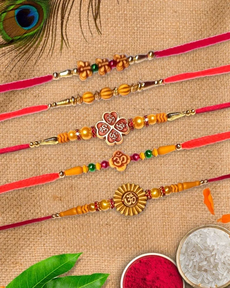 جای شری هندیکرافتس راخی برای برادران برای Raksha Bandan طرح گرد قرمز راخی سنگ مهره طراحی مجموعه راخی 10 عددی جای شری هندیکرافتس راخی برای برادران برای Raksha Bandan طرح گرد قرمز راخی سنگ مهره طراحی مجموعه راخی 10 عددی