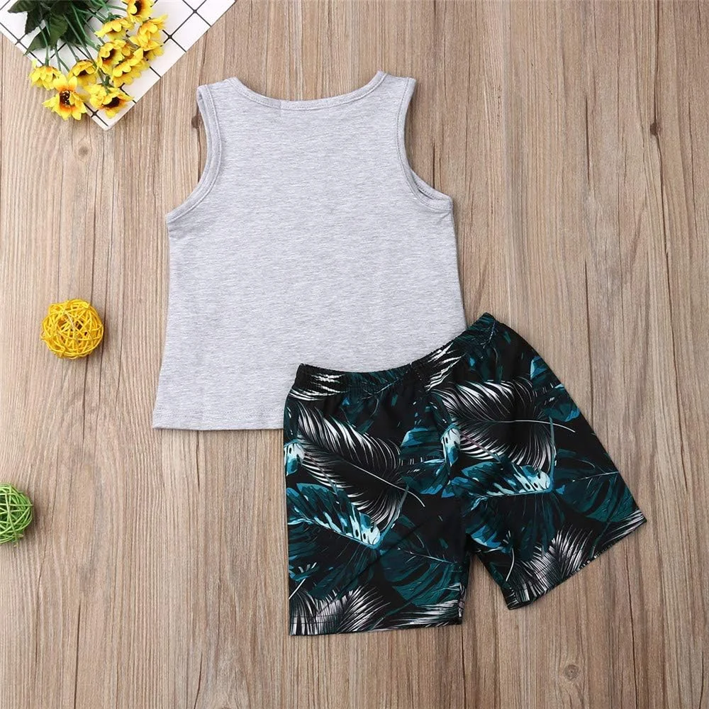 ست شورت و تاپ پسرانه نوزادی و نوپا طرح Mamas Boy، آستین حلقه ای، تی شرت + شورت ساحلی طرح نخل، مناسب فصل تابستان، خاکستری، سایز 12-18 ماه ست شورت و تاپ پسرانه نوزادی و نوپا طرح Mamas Boy، آستین حلقه ای، تی شرت + شورت ساحلی طرح نخل، مناسب فصل تابستان، خاکستری، سایز 12-18 ماه