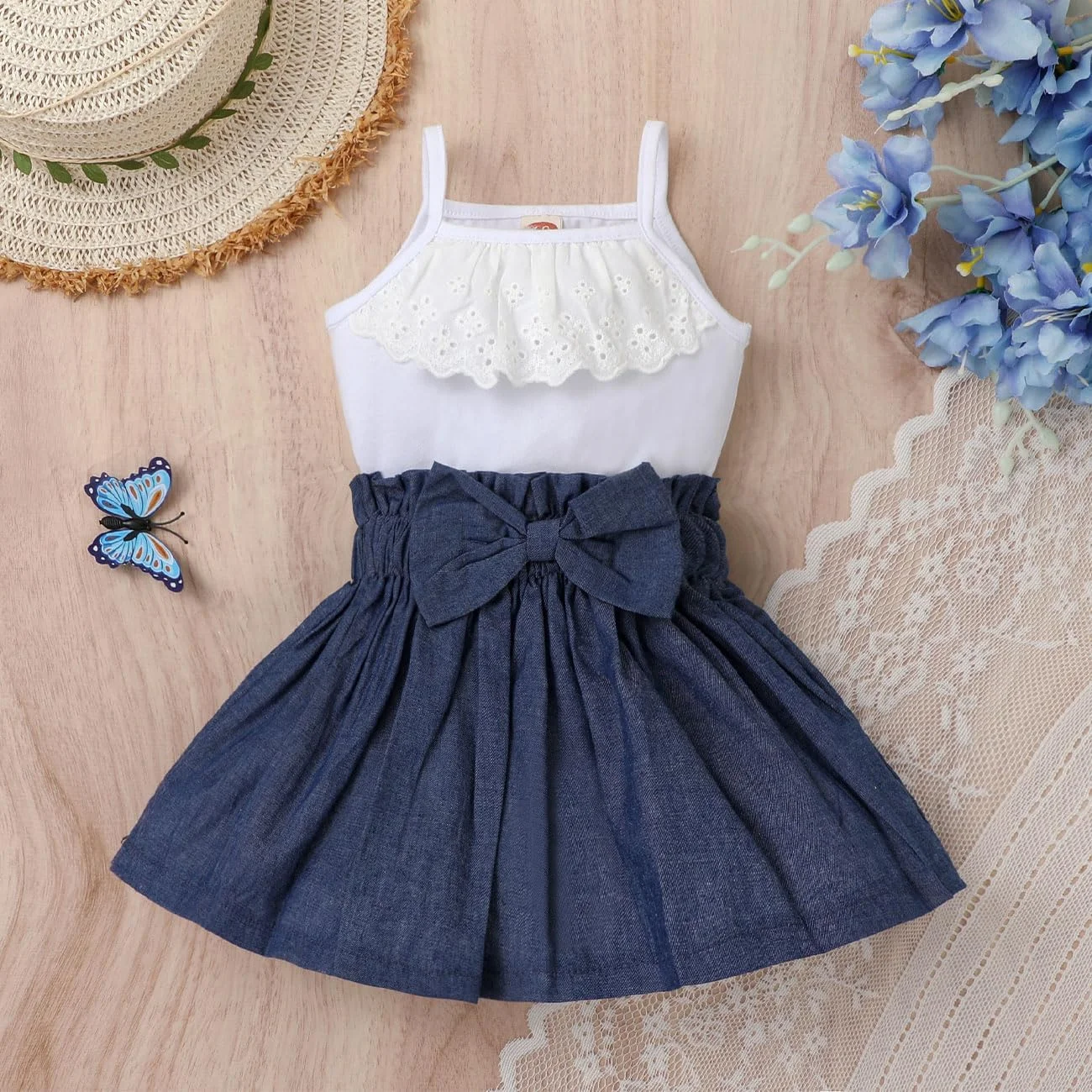 ست لباس دخترانه نوزادی HEOXIN مناسب فصول تابستان و پاییز، شامل تاپ بدون آستین توری و دامن کوتاه پاپیونی ساده، 2 تکه، مناسب برای دختران 3 تا 24 ماهه، آبی ست لباس دخترانه نوزادی HEOXIN مناسب فصول تابستان و پاییز، شامل تاپ بدون آستین توری و دامن کوتاه پاپیونی ساده، 2 تکه، مناسب برای دختران 3 تا 24 ماهه، آبی