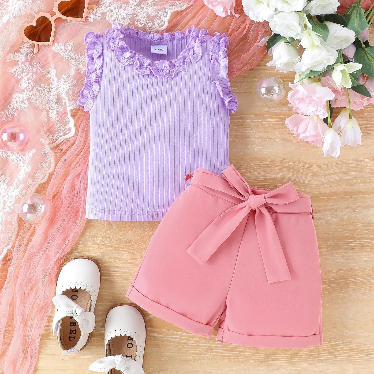 ست لباس تابستانی دخترانه Adokioths شامل تاپ رکابی دنده ای و شورت، مناسب برای کودکان 6، 12، 18، 24 ماهه و سایزهای 2T، 3T، 4T ست لباس تابستانی دخترانه Adokioths شامل تاپ رکابی دنده ای و شورت، مناسب برای کودکان 6، 12، 18، 24 ماهه و سایزهای 2T، 3T، 4T