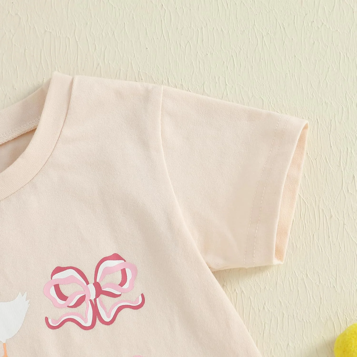 لباس تابستانی نوزاد دختر آستین کوتاه حباب دار رامپر پاپیون طرح غاز چاپ شده بادی تاپ لباس تابستانی نوزاد دختر آستین کوتاه حباب دار رامپر پاپیون طرح غاز چاپ شده بادی تاپ