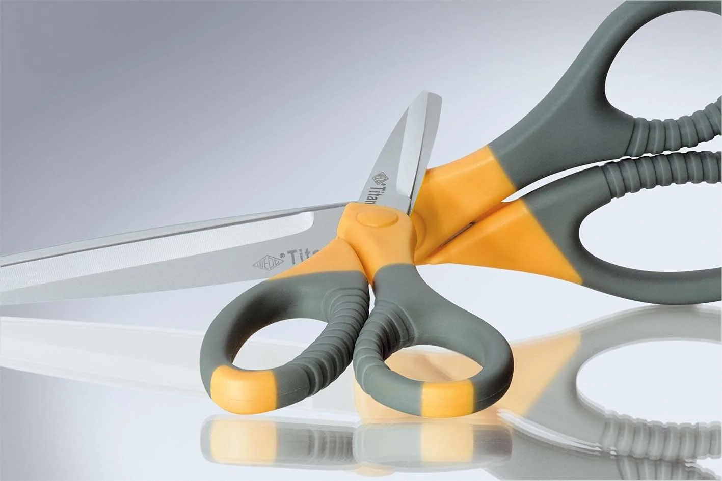 قیچی همه کاره تیتان WEDO EFCO 1803015، خاکستری/نارنجی، 11.5 سانتی متر قیچی همه کاره تیتان WEDO EFCO 1803015، خاکستری/نارنجی، 11.5 سانتی متر