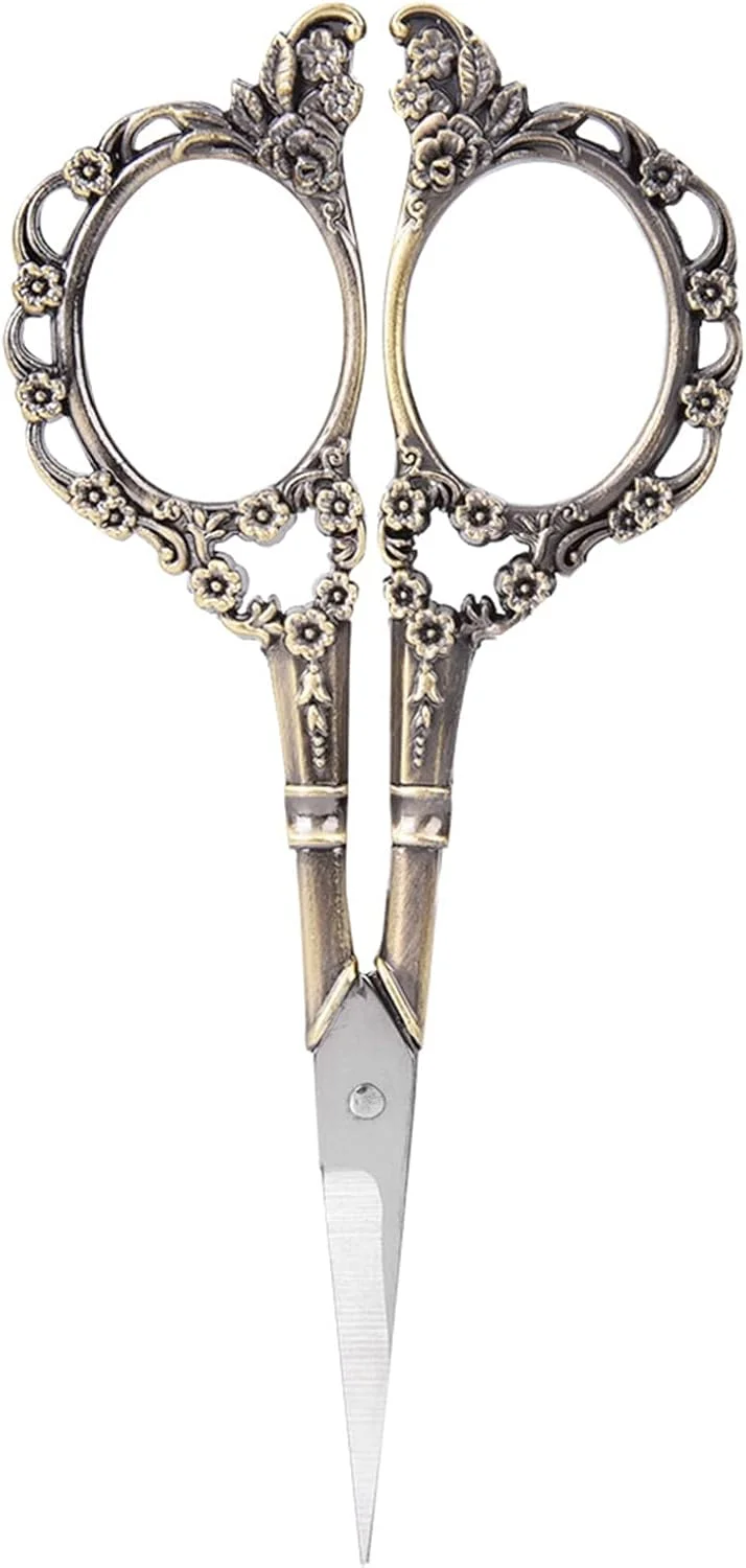 قیچی خیاطی استیل با طرح گل قدیمی برای خیاطی و صنایع دستی (برنزی) قیچی خیاطی استیل با طرح گل قدیمی برای خیاطی و صنایع دستی (برنزی)