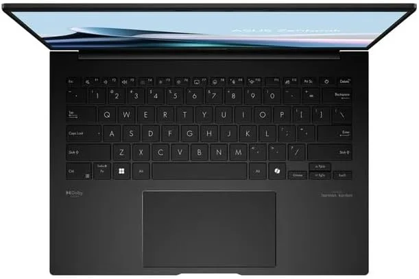 لپ تاپ 14 اینچی ASUS Zenbook، صفحه نمایش لمسی OLED WUXGA، پردازنده AMD Ryzen 7 8840HS هشت هسته ای، گرافیک AMD Radeon، رم 16 گیگابایتی LPDDR5، حافظه SSD 512 گیگابایتی، صفحه کلید با نور پس زمینه، Wi-Fi 6E، دوربین 1080p، ویندوز 11 هوم، همراه با USB 32 گیگابایتی COU