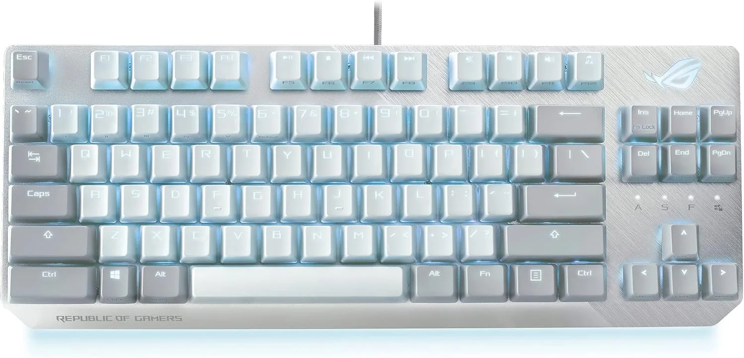 کیبورد گیمینگ مکانیکی سیم دار ASUS ROG Strix Scope NX TKL Moonlight White RGB با کلیدهای خطی قرمز ROG NX، فریم آلومینیومی، نورپردازی Aura Sync، طراحی Tenkeyless، کلیدهای رسانه ای Quick Toggle، Asus42144