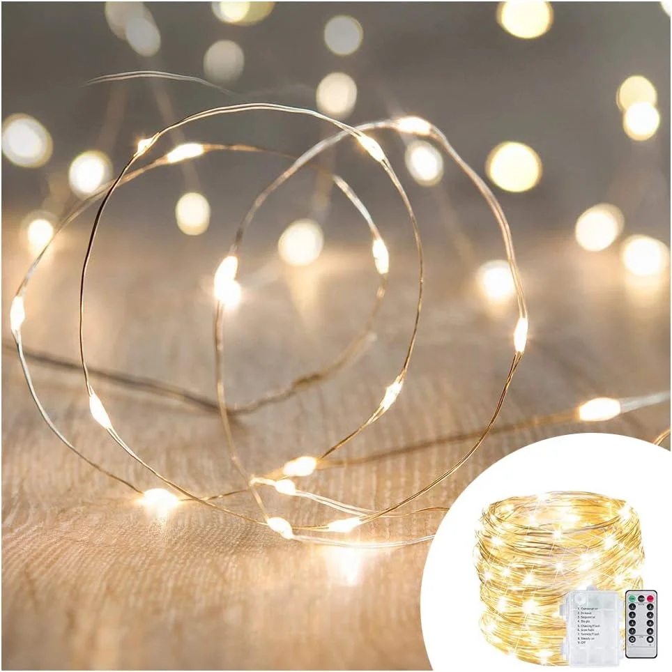 چراغ های تزئینی 100 LED با طول 33 فوت ANJAYLIA، چراغ های رشته ای ضد آب با باتری، 8 حالت نورپردازی برای جشن، عروسی، کریسمس، نور سفید گرم چراغ های تزئینی 100 LED با طول 33 فوت ANJAYLIA، چراغ های رشته ای ضد آب با باتری، 8 حالت نورپردازی برای جشن، عروسی، کریسمس، نور سفید گرم