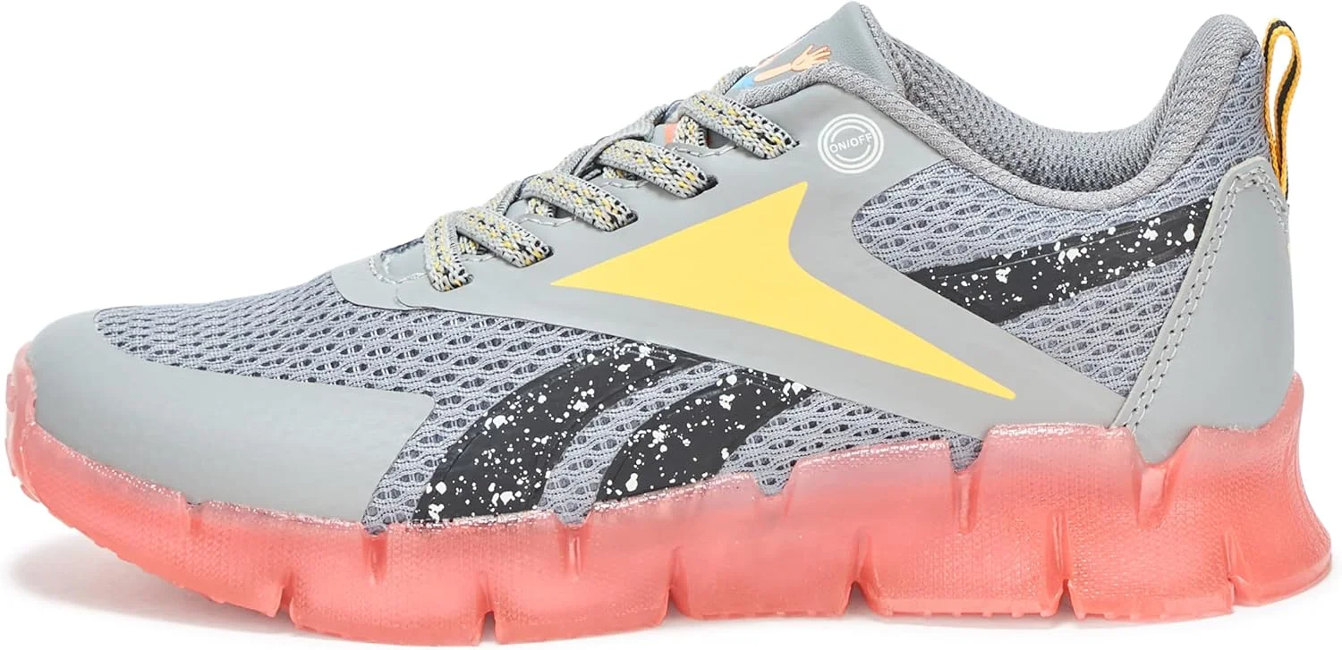 کفش ورزشی بچه گانه ریباک مدل Blippi Zig N' Glow با بند کشی