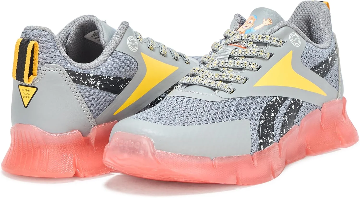 کفش ورزشی بچه گانه ریباک مدل Blippi Zig N' Glow با بند کشی