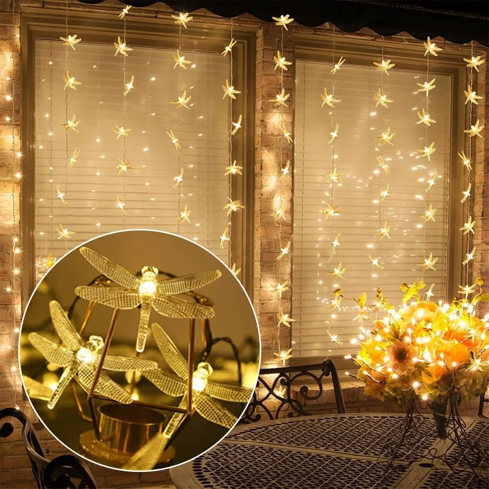 چراغ‌های رشته‌ای سنجاقک AMERTEER، 7 متر 50 LED، چراغ‌های پری آویز سنجاقک با باتری، چراغ‌های پرده‌ای برای هالووین کریسمس، چراغ‌های تزئینی داخلی و خارجی برای تعطیلات خانگی، سفید گرم