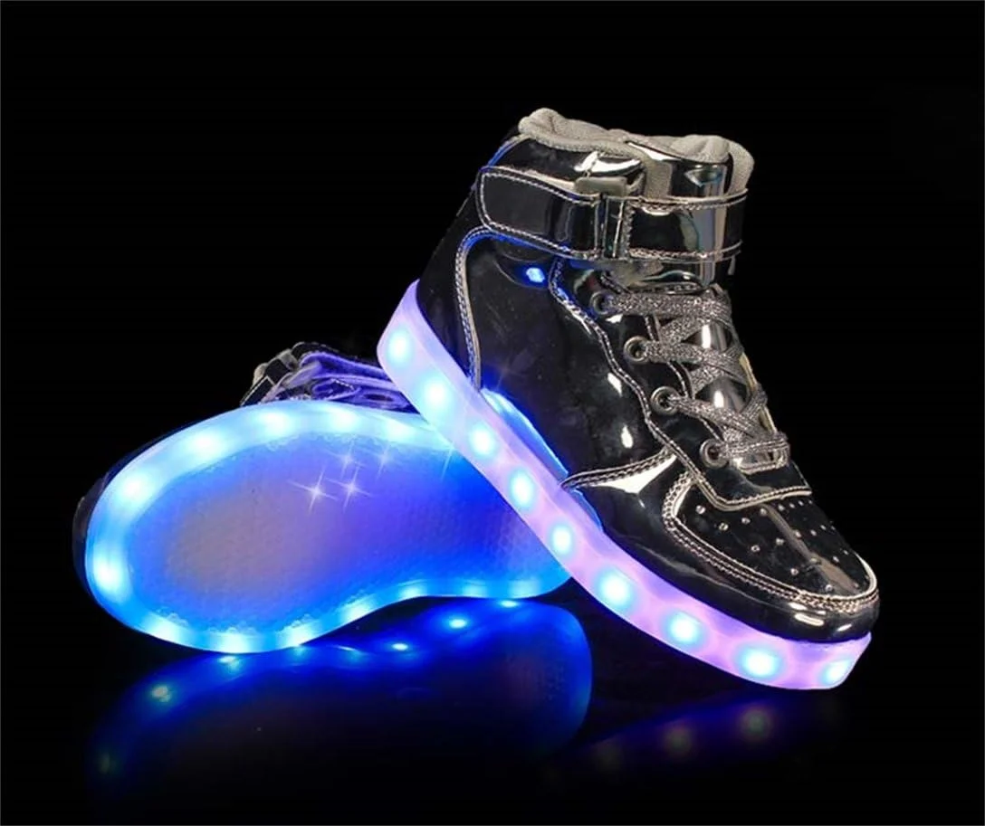 کفش های ال ای دی اسپرت یونیسکس LJ برای کودکان پسران دختران ساق بلند چراغ دار شارژ USB کفش های کتانی ال ای دی چشمک زن 7 حالت رنگی برای مردان و زنان (سایز 30 اروپا / 11.5 انگلیس، نقره ای)
