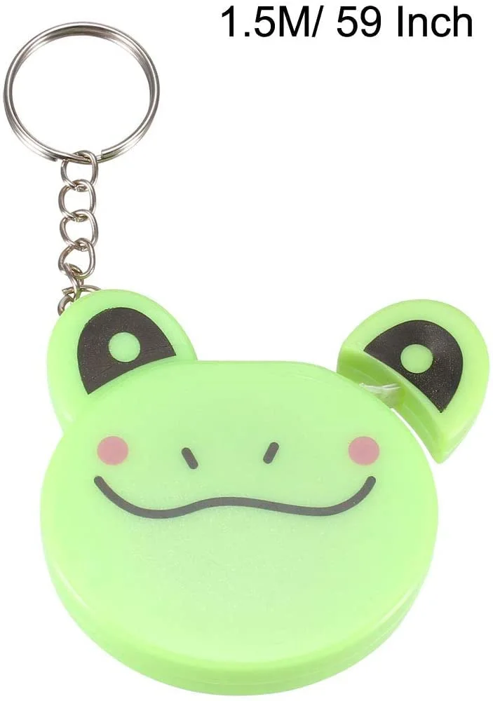 متر خیاطی جمع شونده 1.5 متری دو طرفه نرم XYWHPGV با طرح کارتونی سبز رنگ، مناسب برای اندازه گیری بدن و پارچه به همراه جاکلیدی متر خیاطی جمع شونده 1.5 متری دو طرفه نرم XYWHPGV با طرح کارتونی سبز رنگ، مناسب برای اندازه گیری بدن و پارچه به همراه جاکلیدی