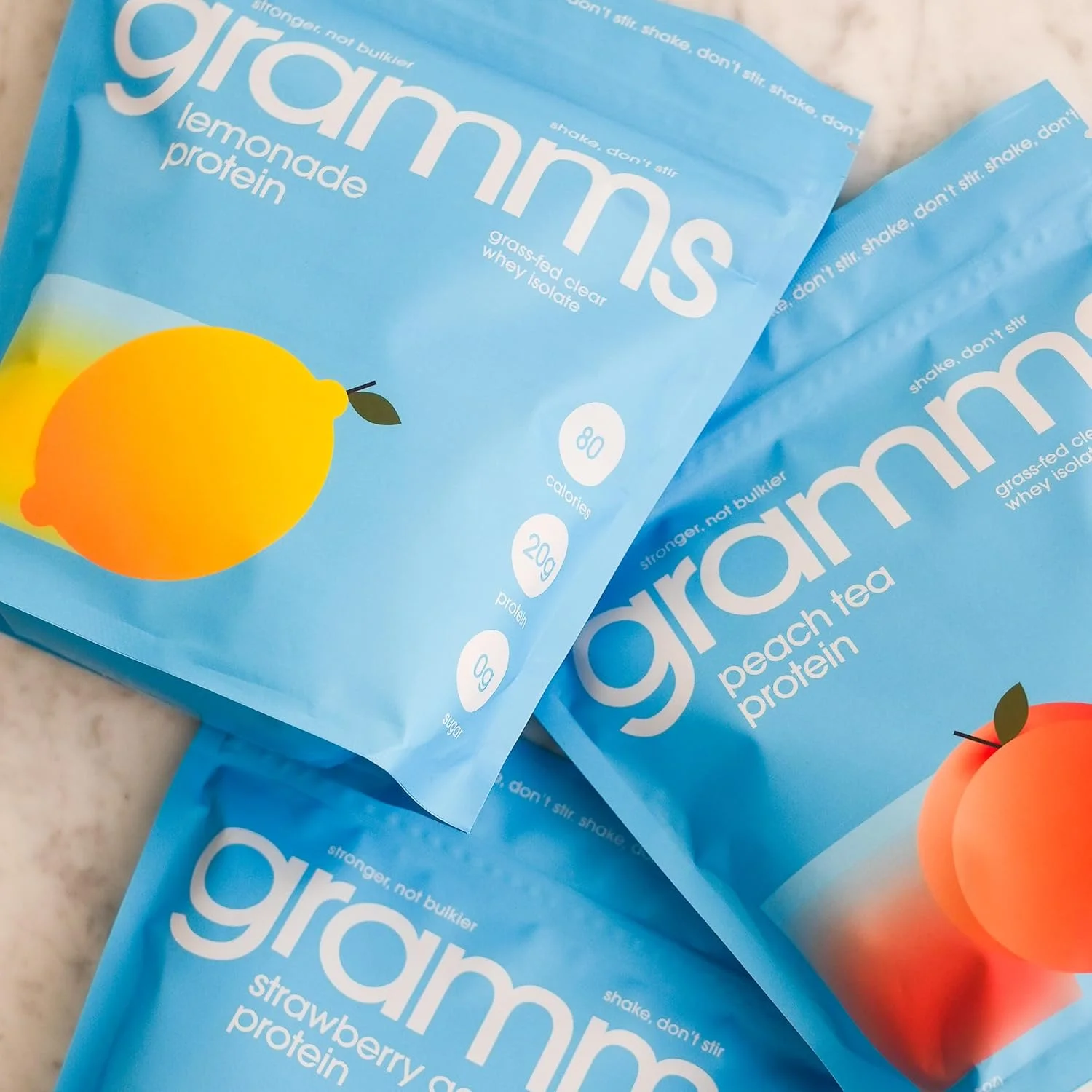 پودر پروتئین شفاف GRAMMS، 20 گرم پروتئین برای زنان و مردان | وی ایزوله تغذیه شده با علف، بدون شکر، بدون لاکتوز، بدون نفخ، غیر GMO (18 سروینگ) (لیموناد) پودر پروتئین شفاف GRAMMS، 20 گرم پروتئین برای زنان و مردان | وی ایزوله تغذیه شده با علف، بدون شکر، بدون لاکتوز، بدون نفخ، غیر GMO (18 سروینگ) (لیموناد)