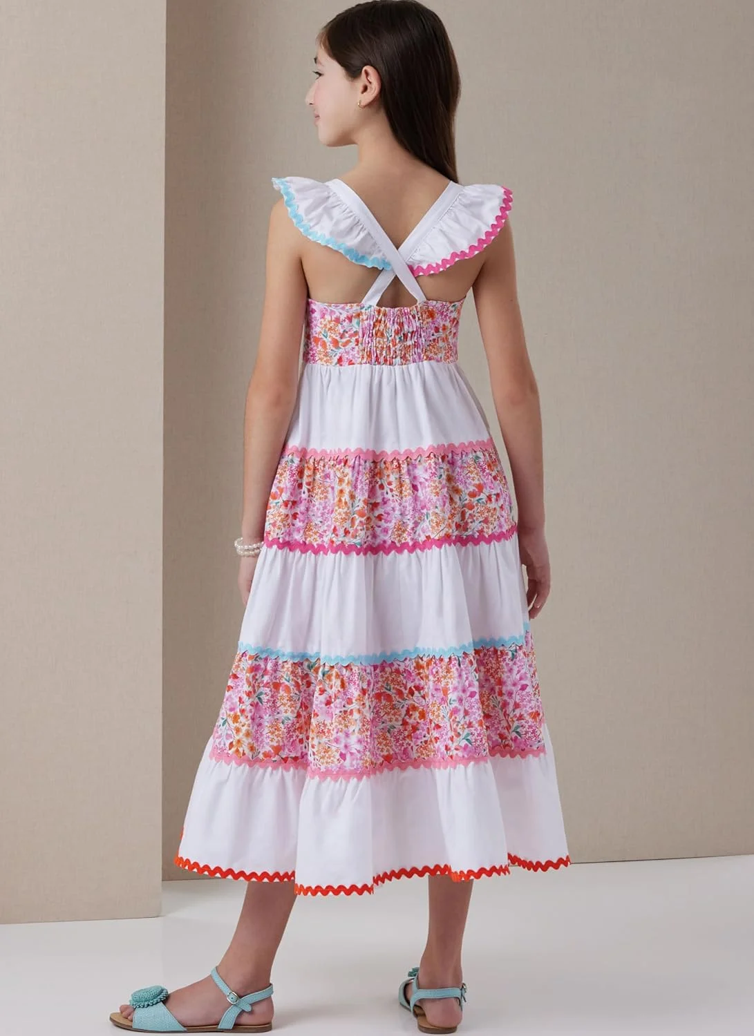 الگوی خیاطی لباس و کلاه دخترانه Butterick B7051A، مدل چند لایه، کد طراحی B7051، سایزهای 7-8-10-12-14 الگوی خیاطی لباس و کلاه دخترانه Butterick B7051A، مدل چند لایه، کد طراحی B7051، سایزهای 7-8-10-12-14