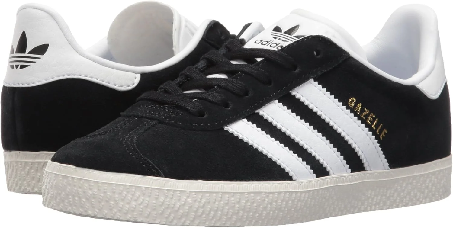کفش ورزشی پسرانه آدیداس اورجینال مدل Gazelle C، مشکی/سفید/طلایی متالیک، سایز 13.5 متوسط ​​آمریکایی کودکانه