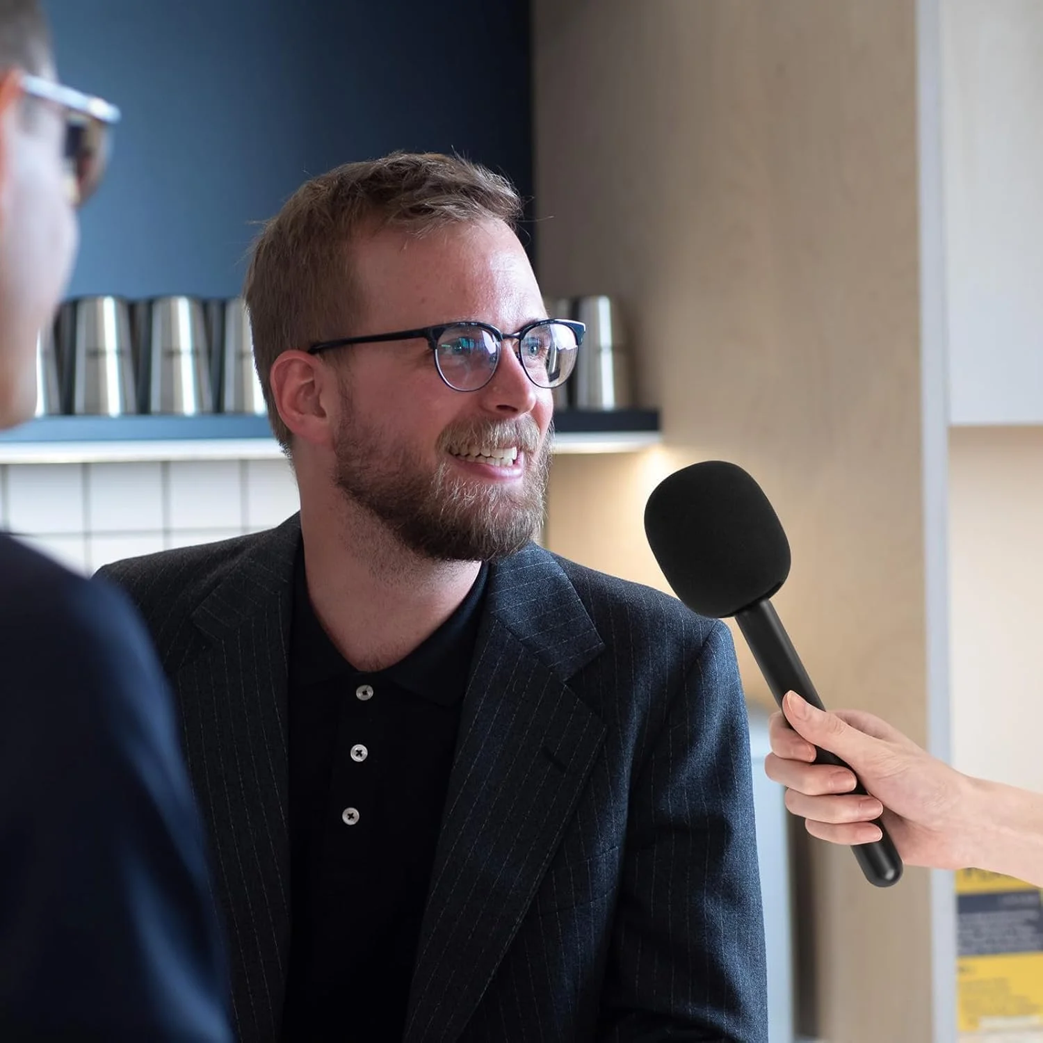 آداپتور میکروفون بی سیم مصاحبه Elterazone Creators - آداپتور دستی Mic GO با محافظ بادگیر، پایه نگهدارنده میکروفون برای DJI MIC 1، MIC 2، Rode Wireless GO II (مشکی)