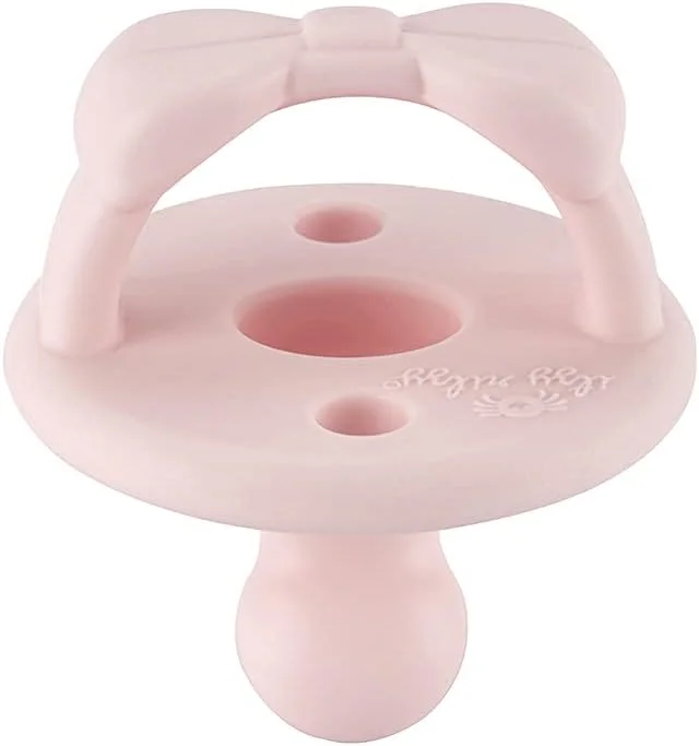 پستانک ارتودنسی سیلیکونی Itzy Ritzy Sweetie Soother با دسته تاشو و دو سوراخ هوا برای ایمنی بیشتر، ست 2 عددی در رنگ های Ballet Slipper و Primrose برای سنین 0-6 ماه