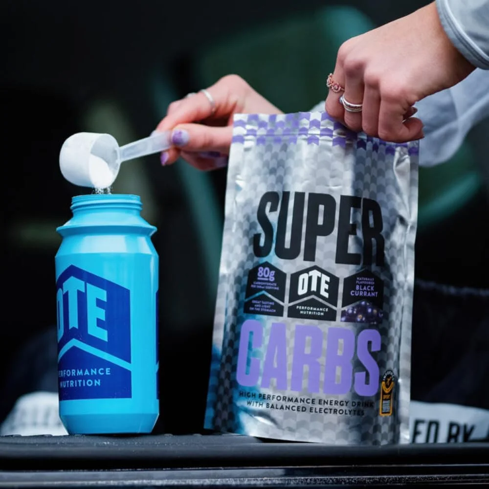 نوشیدنی مکمل انرژی OTE Super Carbs - حاوی 80 گرم کربوهیدرات و تعادل الکترولیت ها - مناسب برای گیاهخواران - 10 سروینگ (انگور سیاه) نوشیدنی مکمل انرژی OTE Super Carbs - حاوی 80 گرم کربوهیدرات و تعادل الکترولیت ها - مناسب برای گیاهخواران - 10 سروینگ (انگور سیاه)