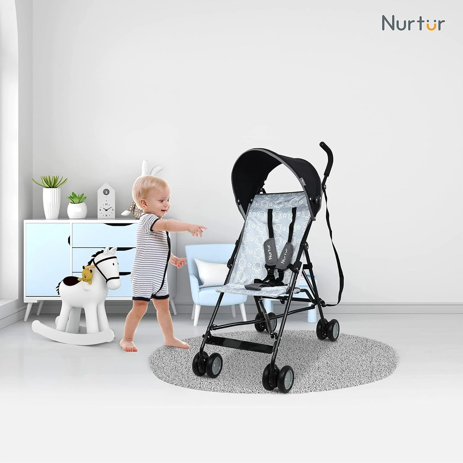 کالسکه سبک وزن Nurtur Rex – تاشو جمع و جور، سایبان آفتاب، بند شانه، طراحی جریان هوا، کالسکه قابل حمل برای کودکان نوپا 6-36 ماهه، تاشو آسان، مشکی/خاکستری کالسکه سبک وزن Nurtur Rex – تاشو جمع و جور، سایبان آفتاب، بند شانه، طراحی جریان هوا، کالسکه قابل حمل برای کودکان نوپا 6-36 ماهه، تاشو آسان، مشکی/خاکستری