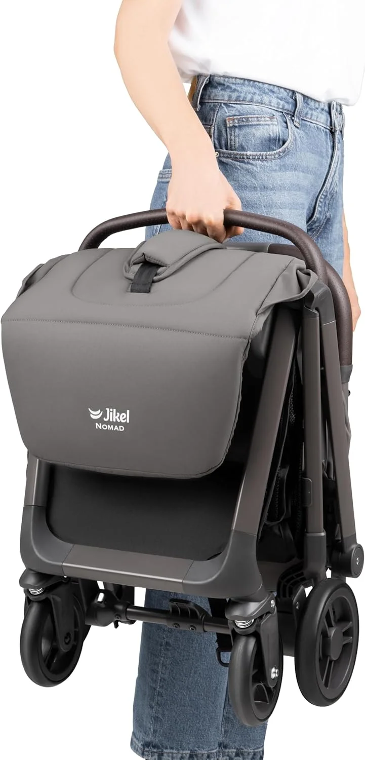 کالسکه مسافرتی تاشو خودکار Jikel Nomad، سبک و فوق العاده جمع و جور، مناسب هواپیما، دارای جا لیوانی، زیرپایی قابل تنظیم، تاشو با یک دست (خاکستری گرافیتی) کالسکه مسافرتی تاشو خودکار Jikel Nomad، سبک و فوق العاده جمع و جور، مناسب هواپیما، دارای جا لیوانی، زیرپایی قابل تنظیم، تاشو با یک دست (خاکستری گرافیتی)