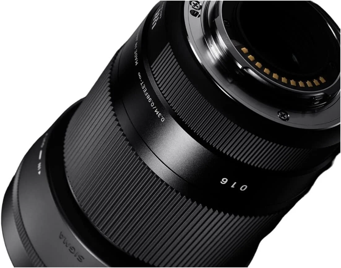 لنز سیگما 30mm F1.4 DC DN Contemporary برای دوربین های بدون آینه نیکون Z به همراه هود لنز LH586-01 (مشکی) به همراه کیف دوربین دوشی، کارت حافظه 64 گیگابایتی SDXC، کیت تمیز کننده و لوازم جانبی (4 قلم) لنز سیگما 30mm F1.4 DC DN Contemporary برای دوربین های بدون آینه نیکون Z به همراه هود لنز LH586-01 (مشکی) به همراه کیف دوربین دوشی، کارت حافظه 64 گیگابایتی SDXC، کیت تمیز کننده و لوازم جانبی (4 قلم)