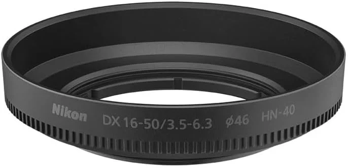 آفتابگیر پیچی نیکون HN-40 مخصوص لنز NIKKOR Z DX 16-50mm f/3.5-6.3 VR. نورهای پراکنده و نورهای مزاحم را به حداقل می رساند. آفتابگیر پیچی نیکون HN-40 مخصوص لنز NIKKOR Z DX 16-50mm f/3.5-6.3 VR. نورهای پراکنده و نورهای مزاحم را به حداقل می رساند.