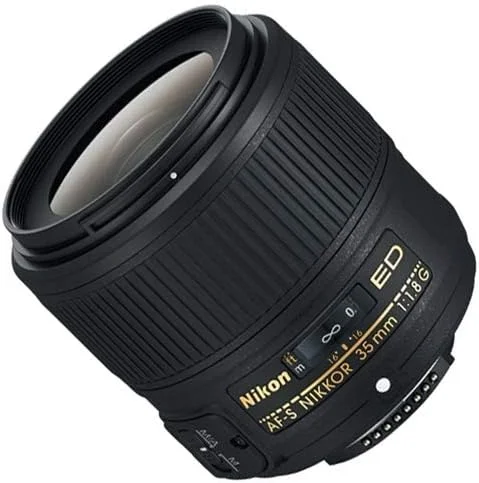 لنز پرایم نیکون AF-S NIKKOR 35mm f/1.8G ED (2215) به همراه کیف لنز پددار + کیت فیلتر ماکرو + فیلترهای UV، CPL، FL + هود گل لاله ای + نگهدارنده درب لنز + کیت تمیز کننده لنز لنز پرایم نیکون AF-S NIKKOR 35mm f/1.8G ED (2215) به همراه کیف لنز پددار + کیت فیلتر ماکرو + فیلترهای UV، CPL، FL + هود گل لاله ای + نگهدارنده درب لنز + کیت تمیز کننده لنز