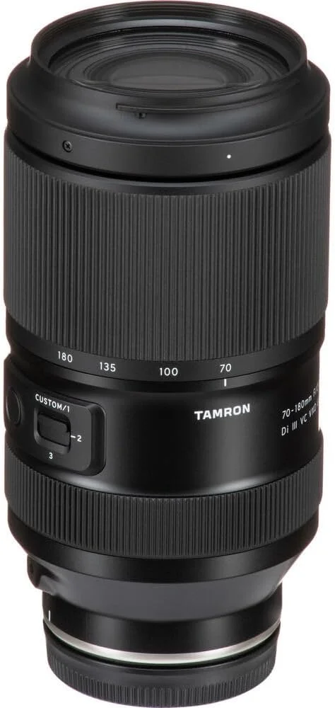 لنز تامرون 70-180mm f/2.8 Di III VC VXD G2 برای Sony E (AFA065S-700) به همراه کارت حافظه 64 گیگابایتی، کیت فیلتر 3 تکه، کوله پشتی، کارت خوان، کیف کارت، کیت تمیز کننده کامل، درپوش لنز لنز تامرون 70-180mm f/2.8 Di III VC VXD G2 برای Sony E (AFA065S-700) به همراه کارت حافظه 64 گیگابایتی، کیت فیلتر 3 تکه، کوله پشتی، کارت خوان، کیف کارت، کیت تمیز کننده کامل، درپوش لنز