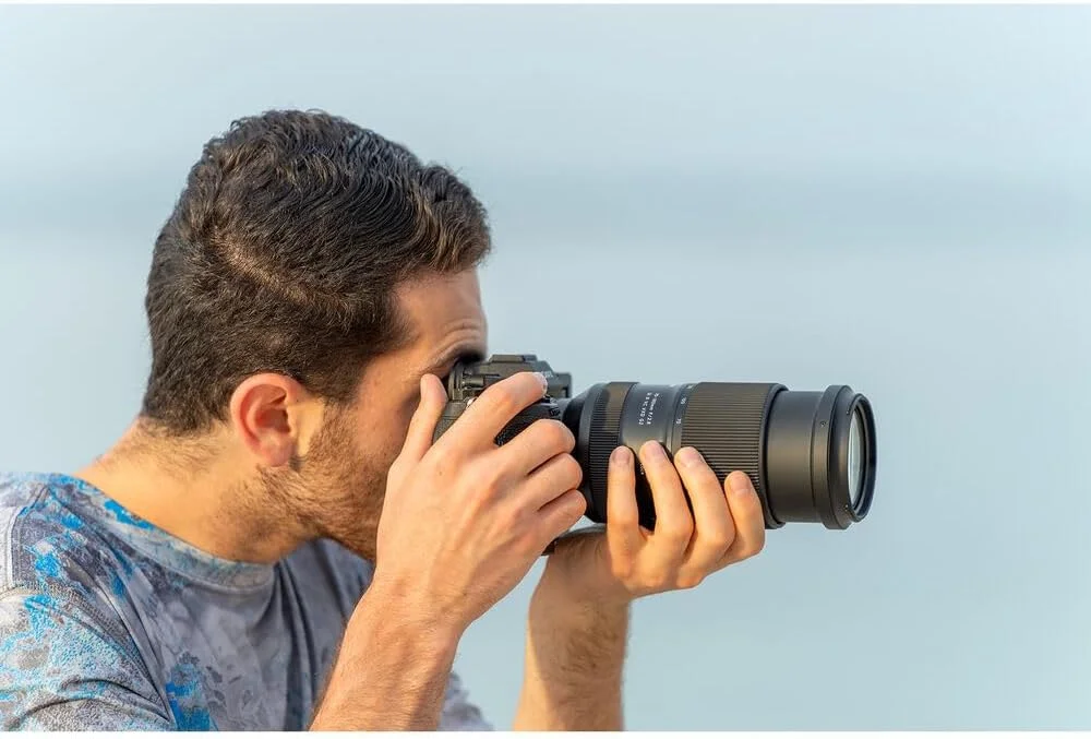 لنز تامرون 70-180mm f/2.8 Di III VC VXD G2 برای Sony E (AFA065S-700) به همراه کارت حافظه 64 گیگابایتی، کیت فیلتر 3 تکه، کوله پشتی، کارت خوان، کیف کارت، کیت تمیز کننده کامل، درپوش لنز لنز تامرون 70-180mm f/2.8 Di III VC VXD G2 برای Sony E (AFA065S-700) به همراه کارت حافظه 64 گیگابایتی، کیت فیلتر 3 تکه، کوله پشتی، کارت خوان، کیف کارت، کیت تمیز کننده کامل، درپوش لنز