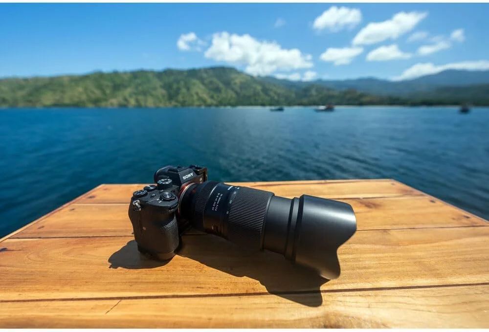 لنز تامرون 70-180mm f/2.8 Di III VC VXD G2 برای Sony E (AFA065S-700) به همراه کارت حافظه 64 گیگابایتی، کیت فیلتر 3 تکه، کوله پشتی، کارت خوان، کیف کارت، کیت تمیز کننده کامل، درپوش لنز لنز تامرون 70-180mm f/2.8 Di III VC VXD G2 برای Sony E (AFA065S-700) به همراه کارت حافظه 64 گیگابایتی، کیت فیلتر 3 تکه، کوله پشتی، کارت خوان، کیف کارت، کیت تمیز کننده کامل، درپوش لنز