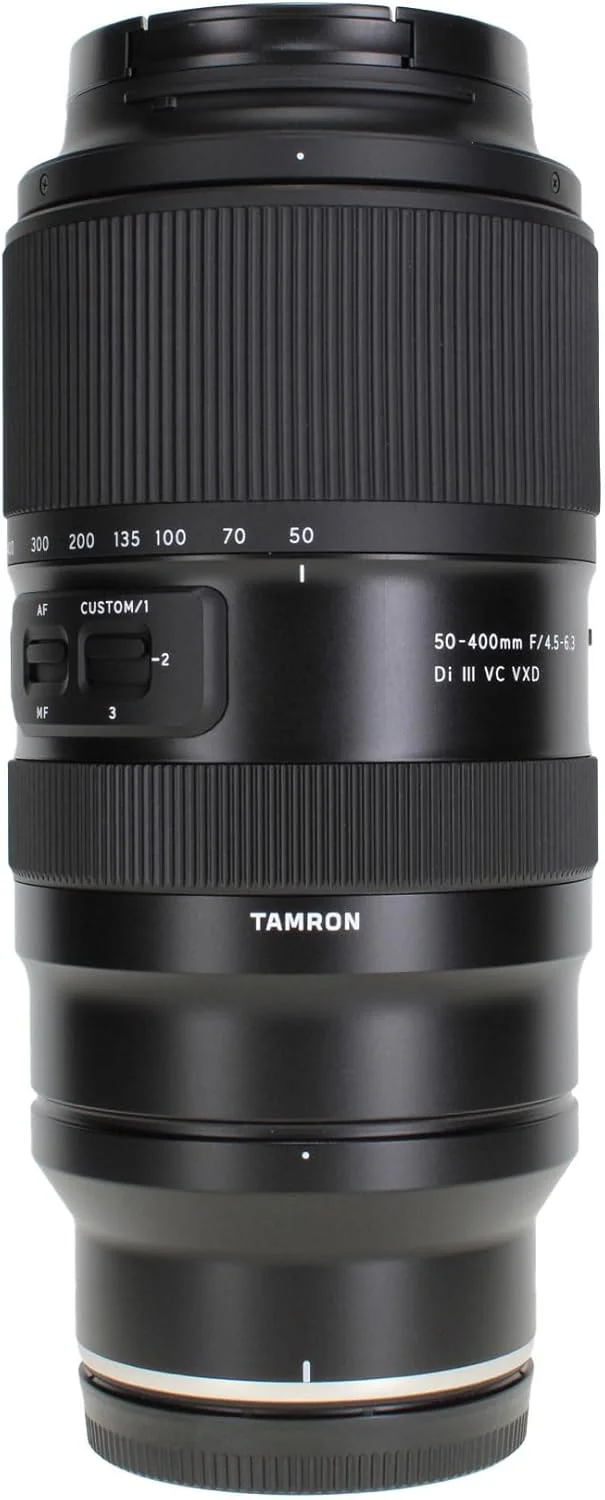لنز تامرون 50-400mm f/4.5-6.3 Di III VC VXD (نیکون Z) (AFA067Z700) + کوله پشتی اسلینگ + نرم افزار عکاسی + کارت حافظه 64 گیگابایتی + کیت فیلتر لنز + سه پایه انعطاف پذیر + کیت تمیز کننده + هود لنز + موارد دیگر لنز تامرون 50-400mm f/4.5-6.3 Di III VC VXD (نیکون Z) (AFA067Z700) + کوله پشتی اسلینگ + نرم افزار عکاسی + کارت حافظه 64 گیگابایتی + کیت فیلتر لنز + سه پایه انعطاف پذیر + کیت تمیز کننده + هود لنز + موارد دیگر