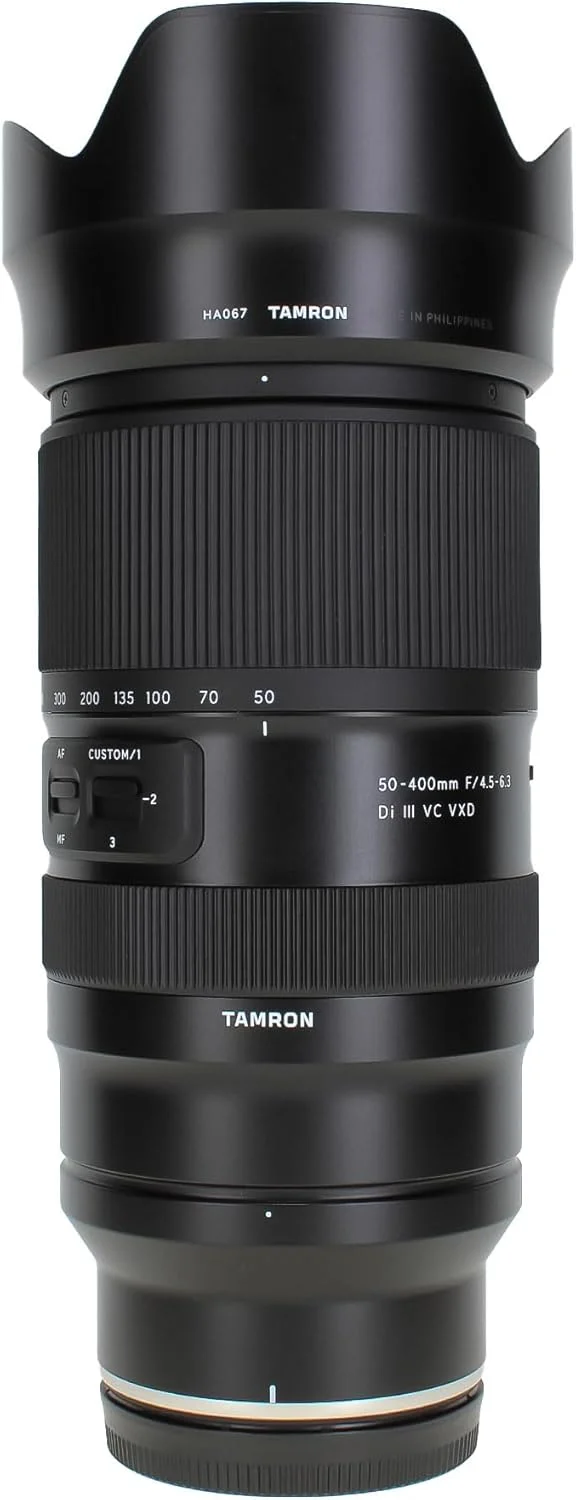 لنز تامرون 50-400mm f/4.5-6.3 Di III VC VXD (نیکون Z) (AFA067Z700) + کوله پشتی اسلینگ + نرم افزار عکاسی + کارت حافظه 64 گیگابایتی + کیت فیلتر لنز + سه پایه انعطاف پذیر + کیت تمیز کننده + هود لنز + موارد دیگر لنز تامرون 50-400mm f/4.5-6.3 Di III VC VXD (نیکون Z) (AFA067Z700) + کوله پشتی اسلینگ + نرم افزار عکاسی + کارت حافظه 64 گیگابایتی + کیت فیلتر لنز + سه پایه انعطاف پذیر + کیت تمیز کننده + هود لنز + موارد دیگر