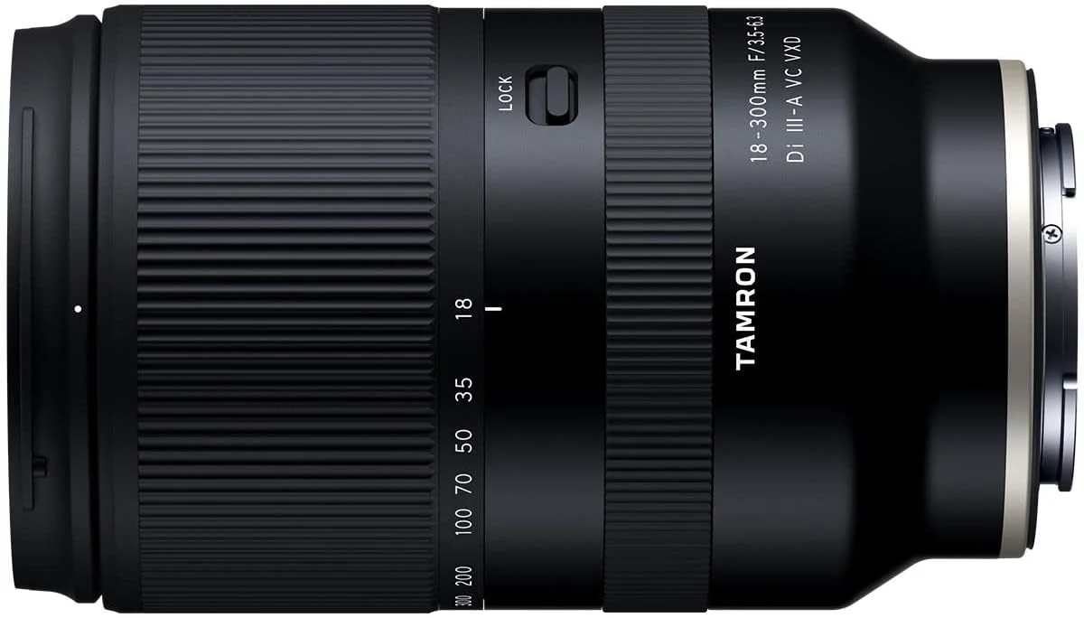 لنز تامرون 18-300mm f/3.5-6.3 Di III-A VC VXD برای Sony E به همراه فیلتر UV 67mm و پارچه تمیز کننده میکروفیبر لنز تامرون 18-300mm f/3.5-6.3 Di III-A VC VXD برای Sony E به همراه فیلتر UV 67mm و پارچه تمیز کننده میکروفیبر