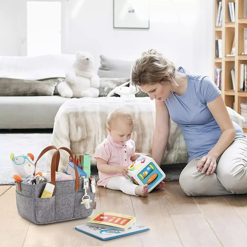 کیف لوازم کودک اِی اِم اِی ان اِی با بند شانه و دسته چرمی، کیف لوازم قابل حمل تاشو برای نوزاد دختر و پسر، سبد بزرگ چند منظوره برای نگهداری پوشک، اسباب بازی، شیشه شیر و دستمال مرطوب