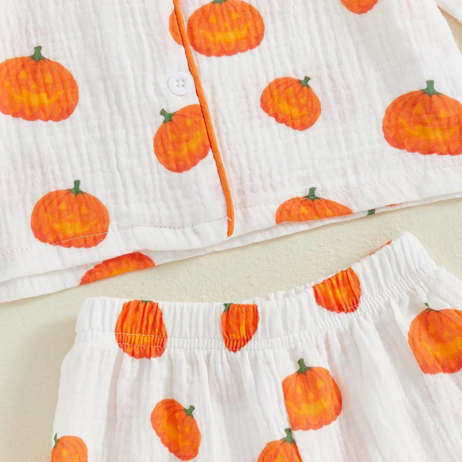 لباس خواب هالووین بچگانه طرح کدو تنبل، پیراهن آستین بلند دکمه دار و شلوار، لباس خواب پنبه ای و کتانی