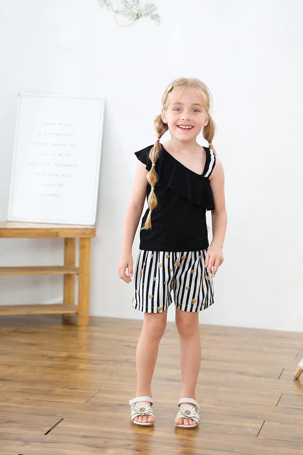 لباس دخترانه DISAUR (12 ماهه تا 5 سال) ست لباس تابستانی دخترانه شامل تاپ بدون آستین با سرشانه باز و شورت گلدار مشکی