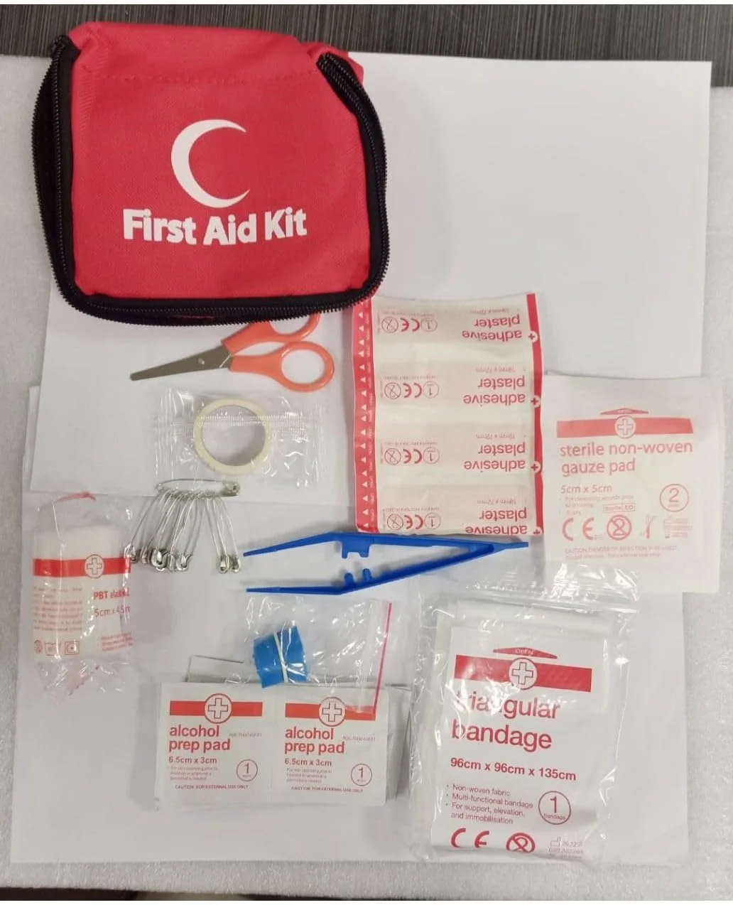 YU WELL Portable First Aid Kit Pouch With 13 Pieces Lightweight Small Emergency Bag Survival Kit For Emergencies At Home Outdoors Travel Car Camping Workplace Hiking And Survival 10X10X10Cm Red 14321