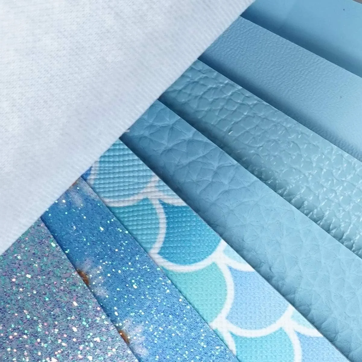 8 تکه چرم مصنوعی 20x30 سانتی متر طرح گل بابونه آبی روشن، اکلیلی درشت، متالیک، طرح پوست لیچی، ورنی، پولک ماهی برای ساخت پاپیون و گوشواره 8 تکه چرم مصنوعی 20x30 سانتی متر طرح گل بابونه آبی روشن، اکلیلی درشت، متالیک، طرح پوست لیچی، ورنی، پولک ماهی برای ساخت پاپیون و گوشواره