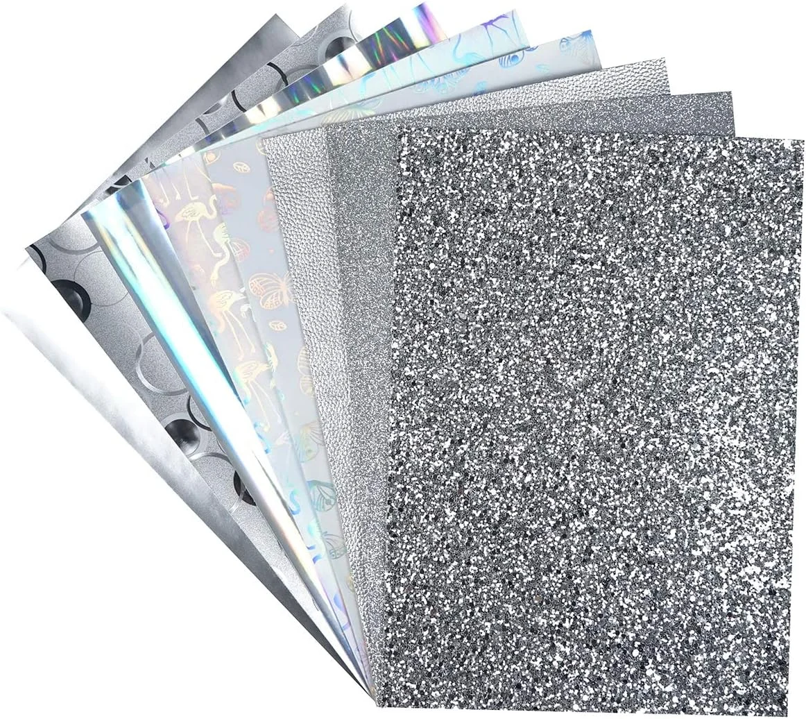 8 تکه ورق چرم مصنوعی 20x30 سانتی‌متری نقره‌ای اکلیلی درشت، چرم متالیک لیچی، ورنی، هولوگرافیک، طرح پروانه، فلامینگو و دایره‌ای برای ساخت گوشواره و پاپیون
