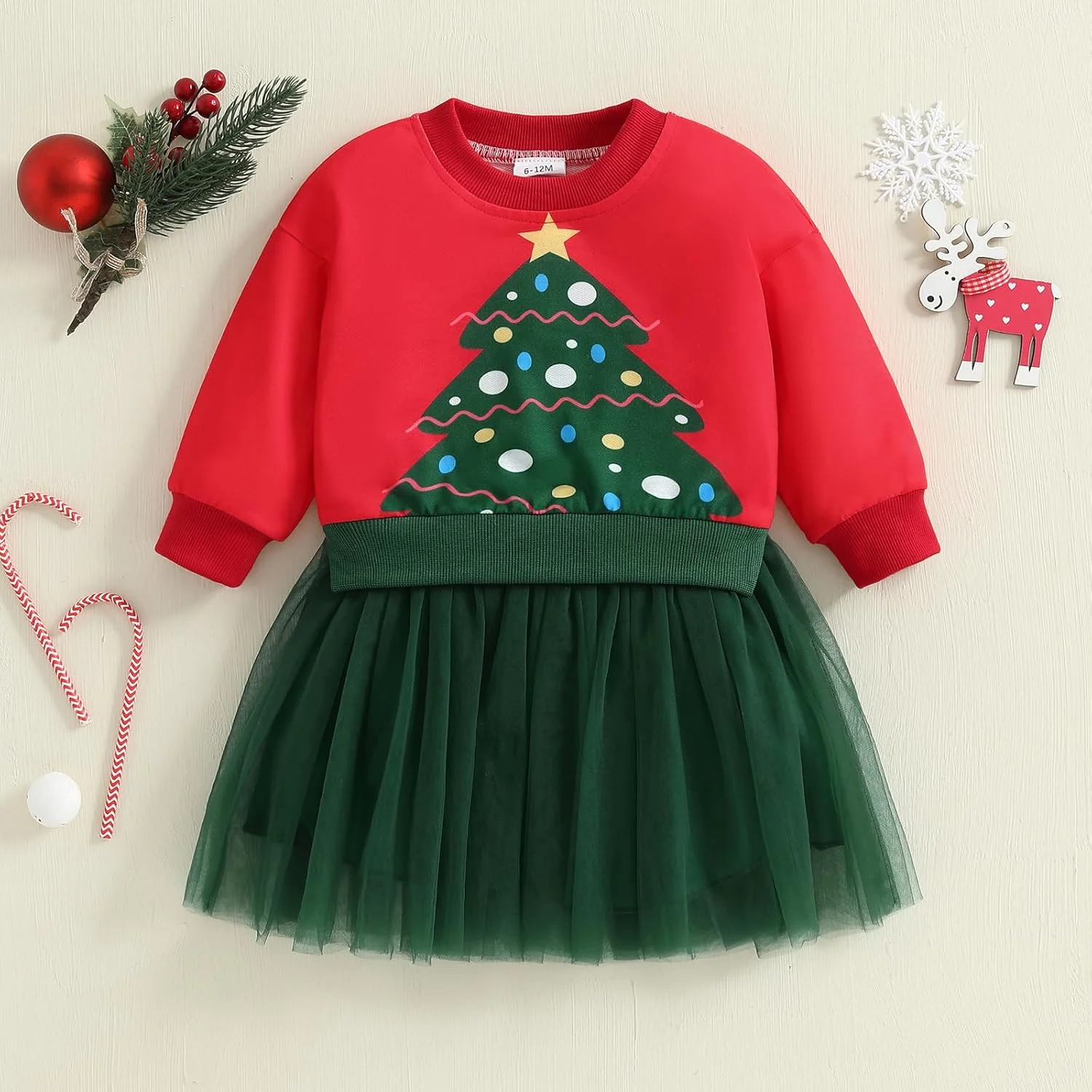 ست لباس کریسمس دخترانه شامل بلوز آستین بلند با طرح درخت کریسمس و دامن توری، ست 2 تکه ست لباس کریسمس دخترانه شامل بلوز آستین بلند با طرح درخت کریسمس و دامن توری، ست 2 تکه