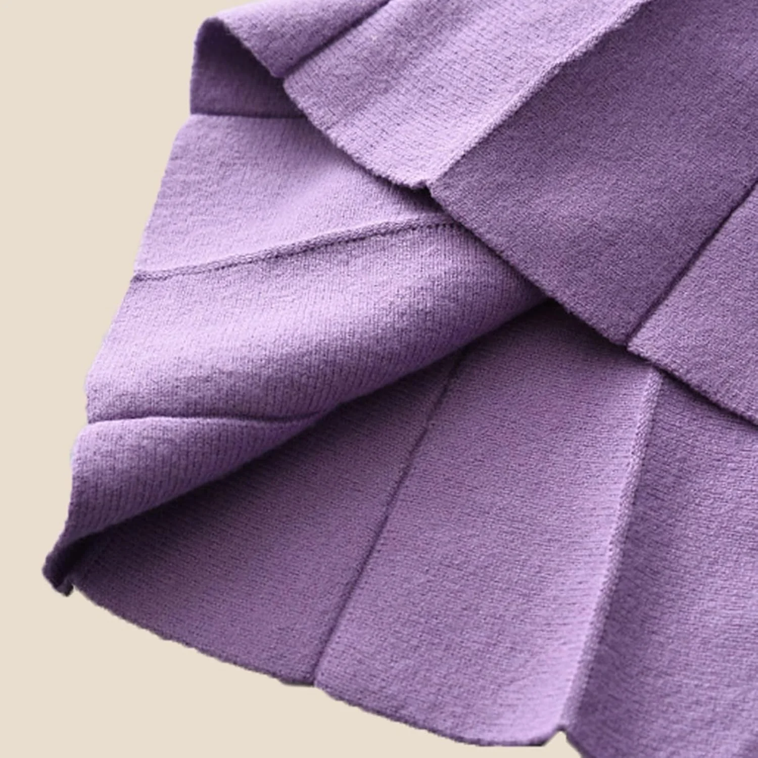 ست لباس پاییزی دخترانه بالاتاله شامل پلیور بافتنی آستین بلند و دامن کوتاه پلیسه دار مناسب فصل پاییز و زمستان