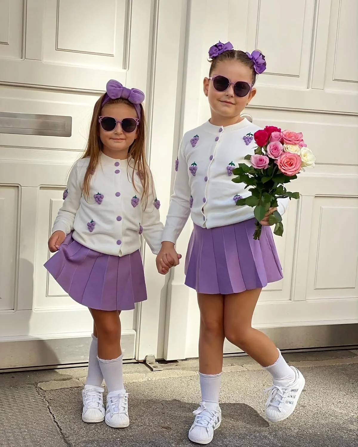 ست لباس پاییزی دخترانه بالاتاله شامل پلیور بافتنی آستین بلند و دامن کوتاه پلیسه دار مناسب فصل پاییز و زمستان