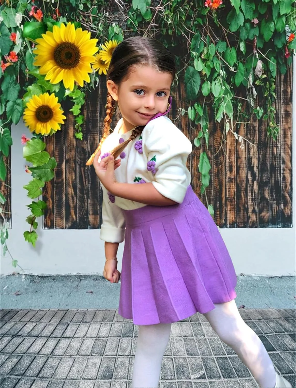 ست لباس پاییزی دخترانه بالاتاله شامل پلیور بافتنی آستین بلند و دامن کوتاه پلیسه دار مناسب فصل پاییز و زمستان