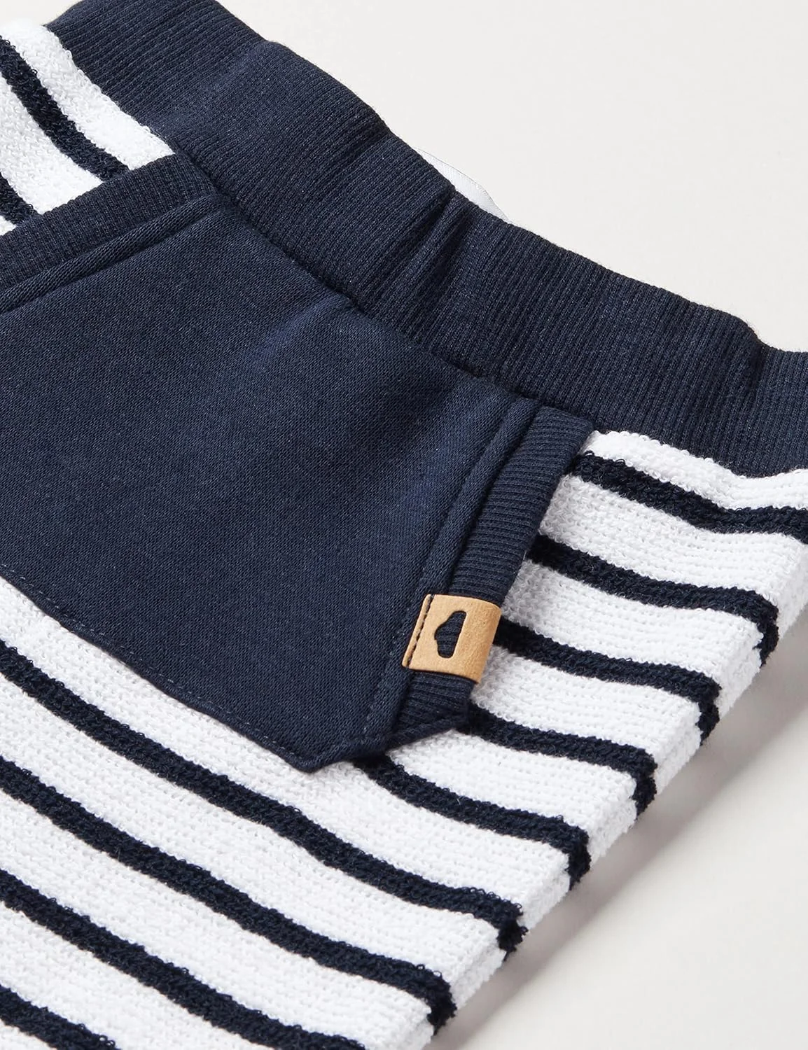 شلوار پسرانه نوزادی نیم ایت مدل Nbmherto Sweat Pant Unb شلوار پسرانه نوزادی نیم ایت مدل Nbmherto Sweat Pant Unb