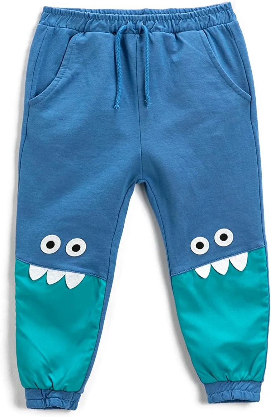 شلوار جاگر پسرانه نوزادی KOTON با طرح هیولا، دارای جزئیات اپلیکه روی زانو و جیب شلوار جاگر پسرانه نوزادی KOTON با طرح هیولا، دارای جزئیات اپلیکه روی زانو و جیب