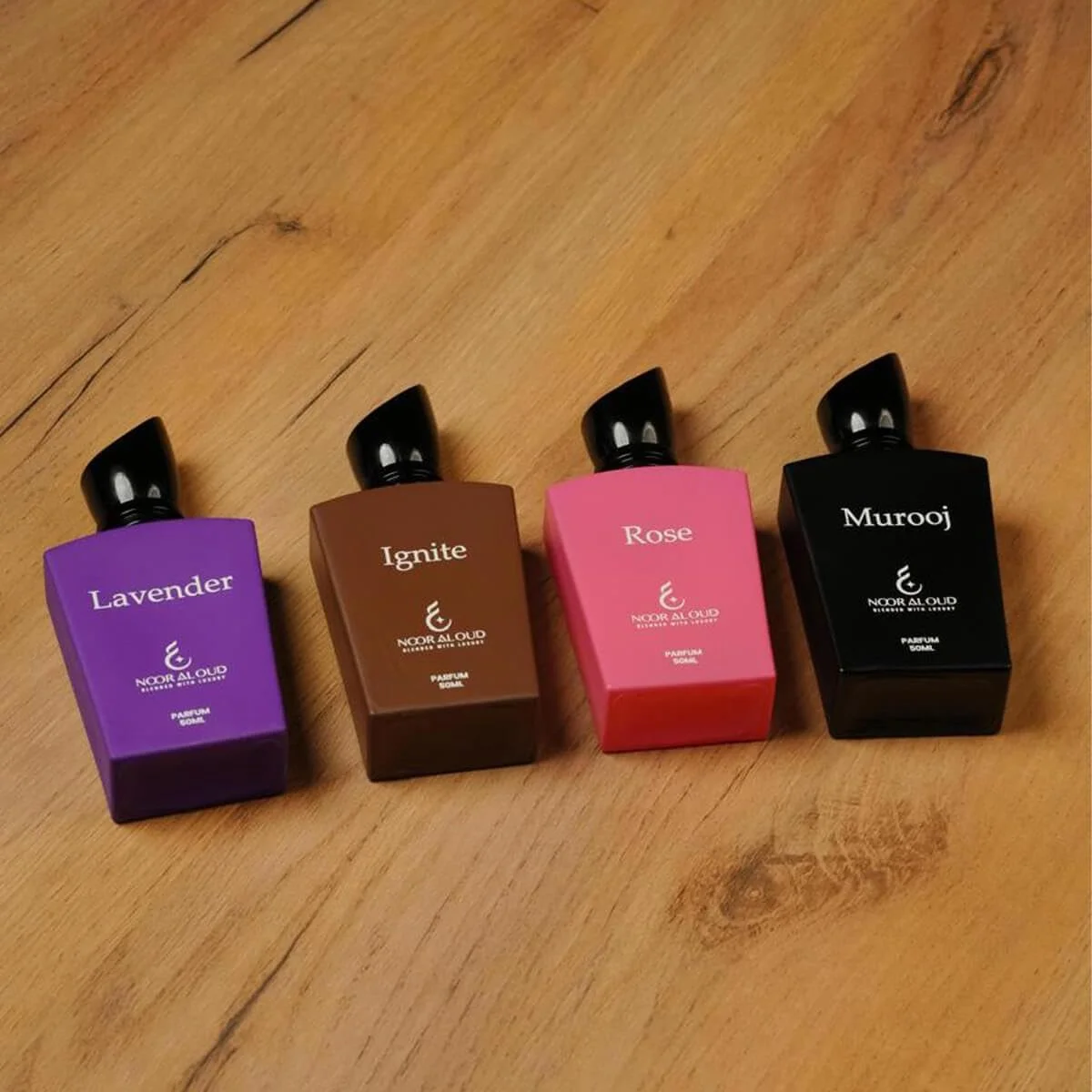 مجموعه عطر 4 در 1 نور العود همس العشق | عطر унисекс | ادو پرفیوم ماندگار | رایحه های عود، رز، اسطوخودوس و شرقی | 4 عدد 50 میلی لیتر