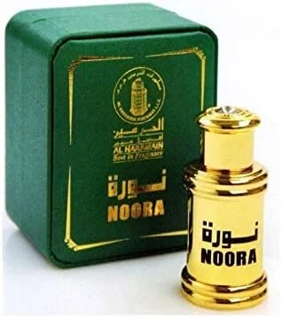 عطر روغنی نورا الحرمین – 12 میلی لیتر | عطر شرقی یونیسکس با رایحه میوه ای، گلی و عود | عطر غلیظ و ماندگار بدون الکل برای آقایان و بانوان