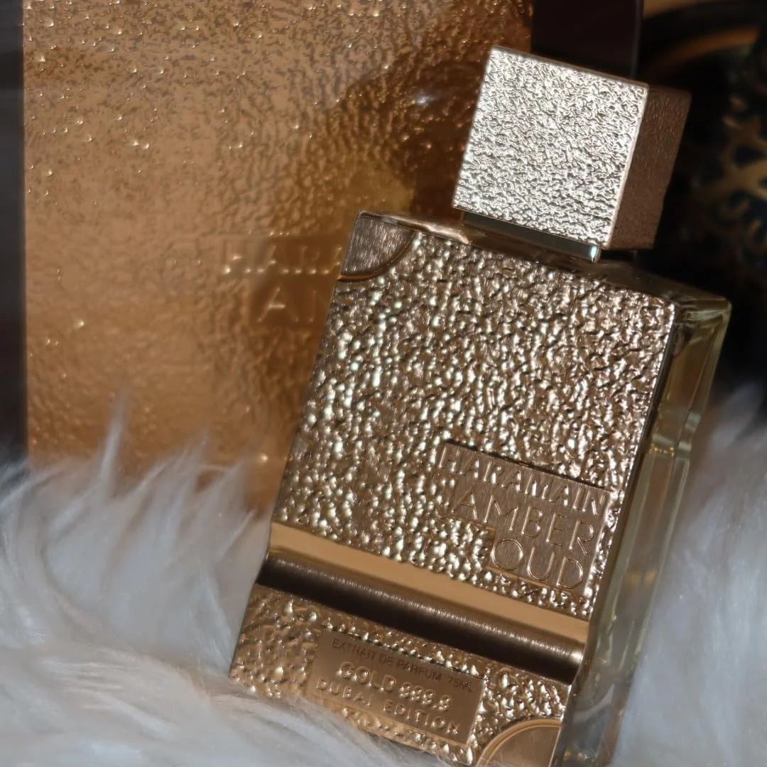 ادکلن الحرمین Amber Oud Gold 999.9 Dubai Edition اکستریت د پرفیوم | اسپری لوکس 100 میلی لیتری با اتومایزر | عطر شرقی ماندگار و یونیسکس با رایحه عنبر، وانیل، نعناع هندی، گلابی و یاس