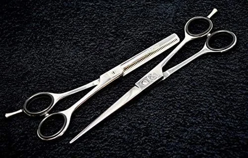 قیچی آرایشگری تیز و قیچی پیتاژ مو XPERSIS PRO، سبک وزن، ساخته شده از فولاد ممتاز آلمانی با تکیه گاه انگشت قیچی آرایشگری تیز و قیچی پیتاژ مو XPERSIS PRO، سبک وزن، ساخته شده از فولاد ممتاز آلمانی با تکیه گاه انگشت