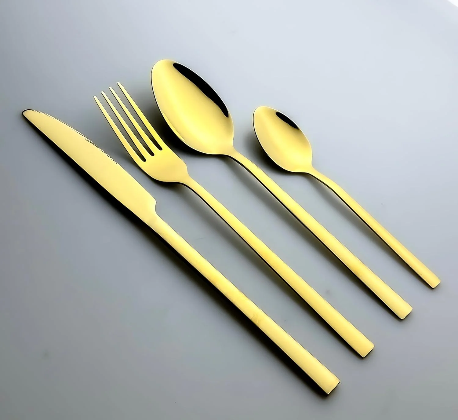 ست کارد و چنگال 16 پارچه استیل ضد زنگ Cuisine Art Ezra، طلایی براق || ست столовые приборы با ظرافت همیشگی برای هر مناسبت || قاشق، چنگال، چاقو ست کارد و چنگال 16 پارچه استیل ضد زنگ Cuisine Art Ezra، طلایی براق || ست столовые приборы با ظرافت همیشگی برای هر مناسبت || قاشق، چنگال، چاقو