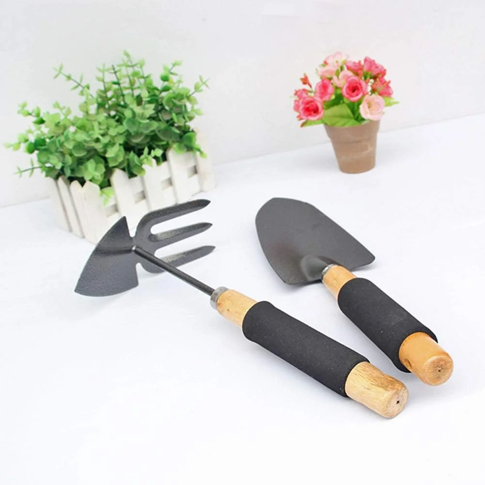 ست باغبانی پنج تکه دسته مشکی شامل بیل بزرگ، بیل کوچک، شن کش، بیلچه گل و ابزار باغبانی دو منظوره
